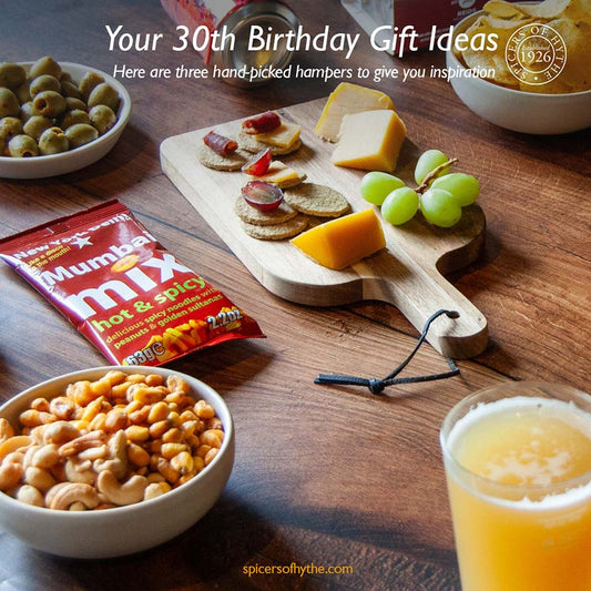 A cover for a gift guide including beer and cheese